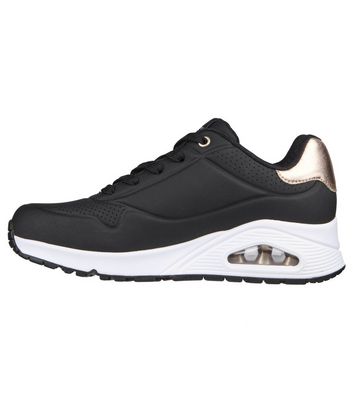 Sketchers black store and gold