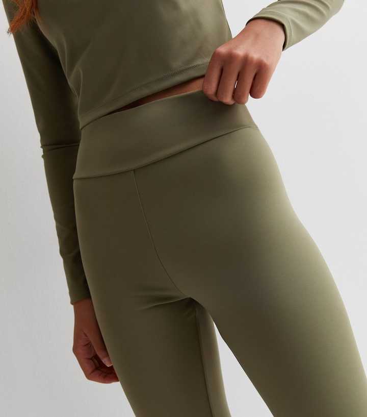 https://media2.newlookassets.com/i/newlook/878274534M2/girls/girls-clothing/girls-leggings/girls-khaki-high-waist-sports-leggings.jpg?strip=true&qlt=50&w=720