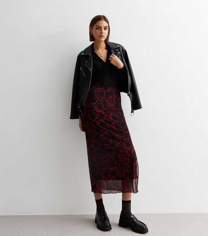 https://media2.newlookassets.com/i/newlook/878646009/womens/clothing/skirts/black-rose-mesh-midaxi-skirt.jpg?strip=true&qlt=50&w=720