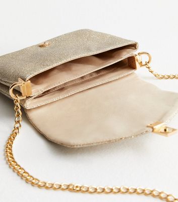 Gold cross over bag best sale