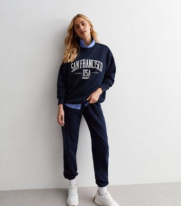 Navy blue best sale sweatshirt outfit