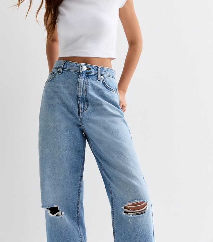 https://media2.newlookassets.com/i/newlook/881532440M3/girls/girls-clothing/girls-jeans/girls-blue-high-waist-ripped-wide-leg-jeans.jpg?strip=true&qlt=50&w=720