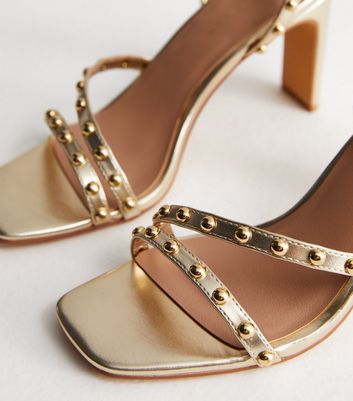 Gold studded block on sale heels