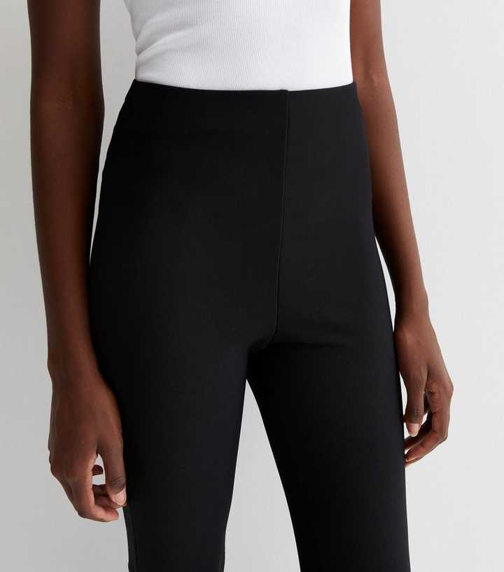 https://media2.newlookassets.com/i/newlook/883225801M1/womens/clothing/leggings/tall-black-flared-leggings.jpg?strip=true&qlt=50&w=720