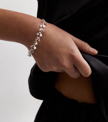 Silver bracelet with star on sale charm