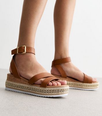 Flatform store tan sandals