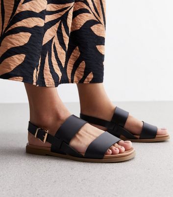 Extra wide store leather sandals