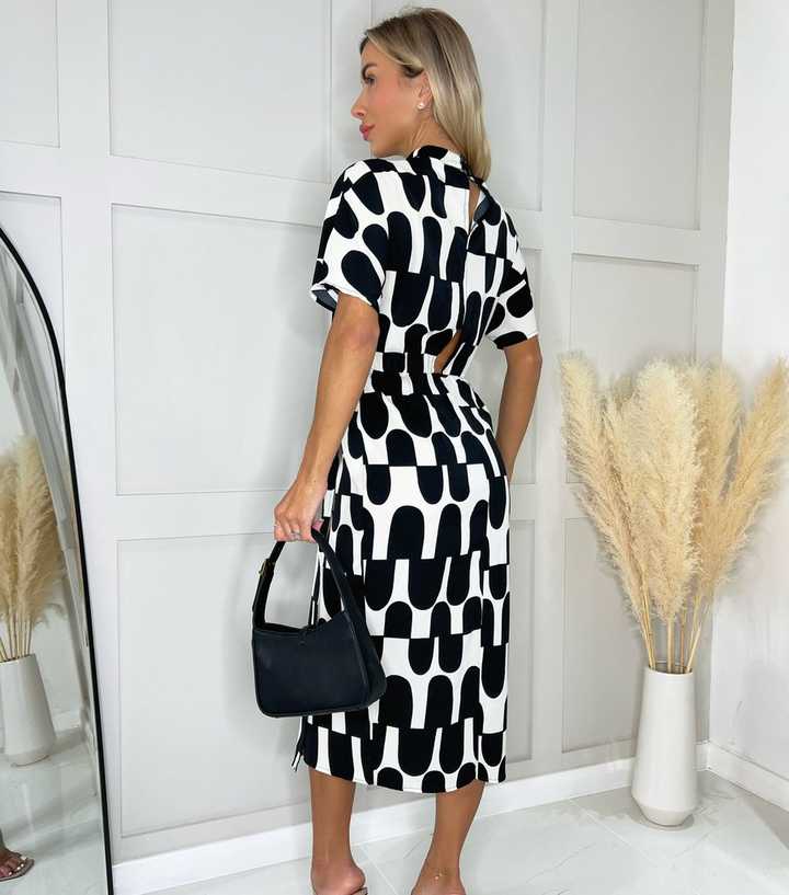 black and white midi dress for women Black and White Cut-Out Long Sleeve Midi Dress main image 1