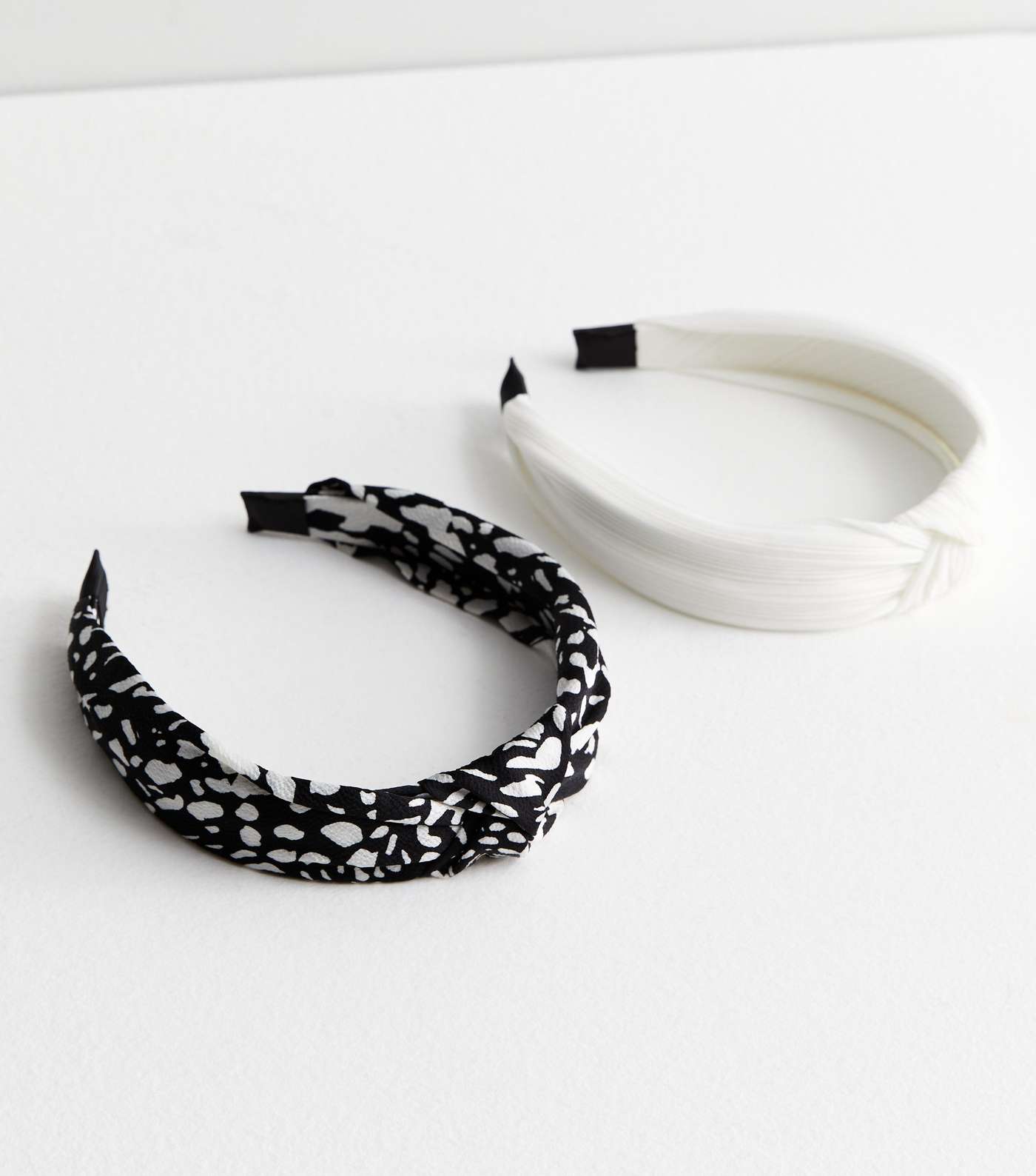 2 Pack Black Abstract Print and White Headbands Image 2