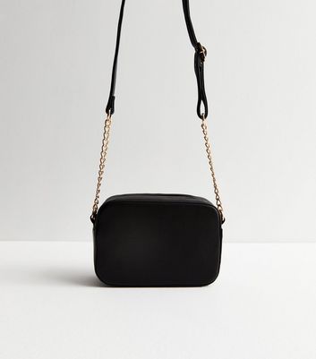 Small black bag on sale with gold chain