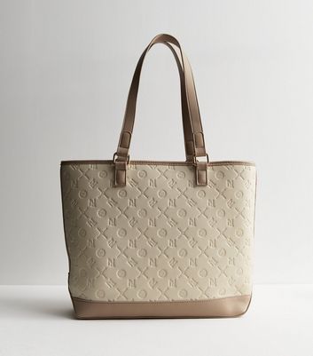 Gucci embossed tote sale