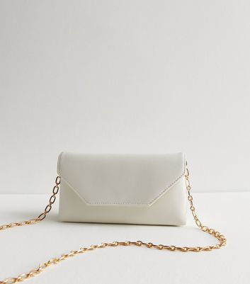 Cream designer clutch bag best sale