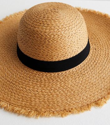 Tan floppy hat on sale