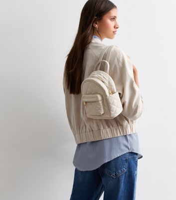 Mini beige backpack sale