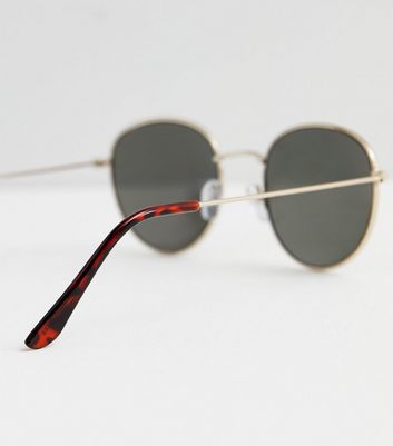 Round black hotsell gold sunglasses