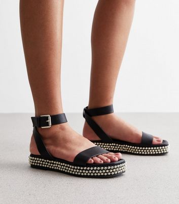 Black store studded flatforms