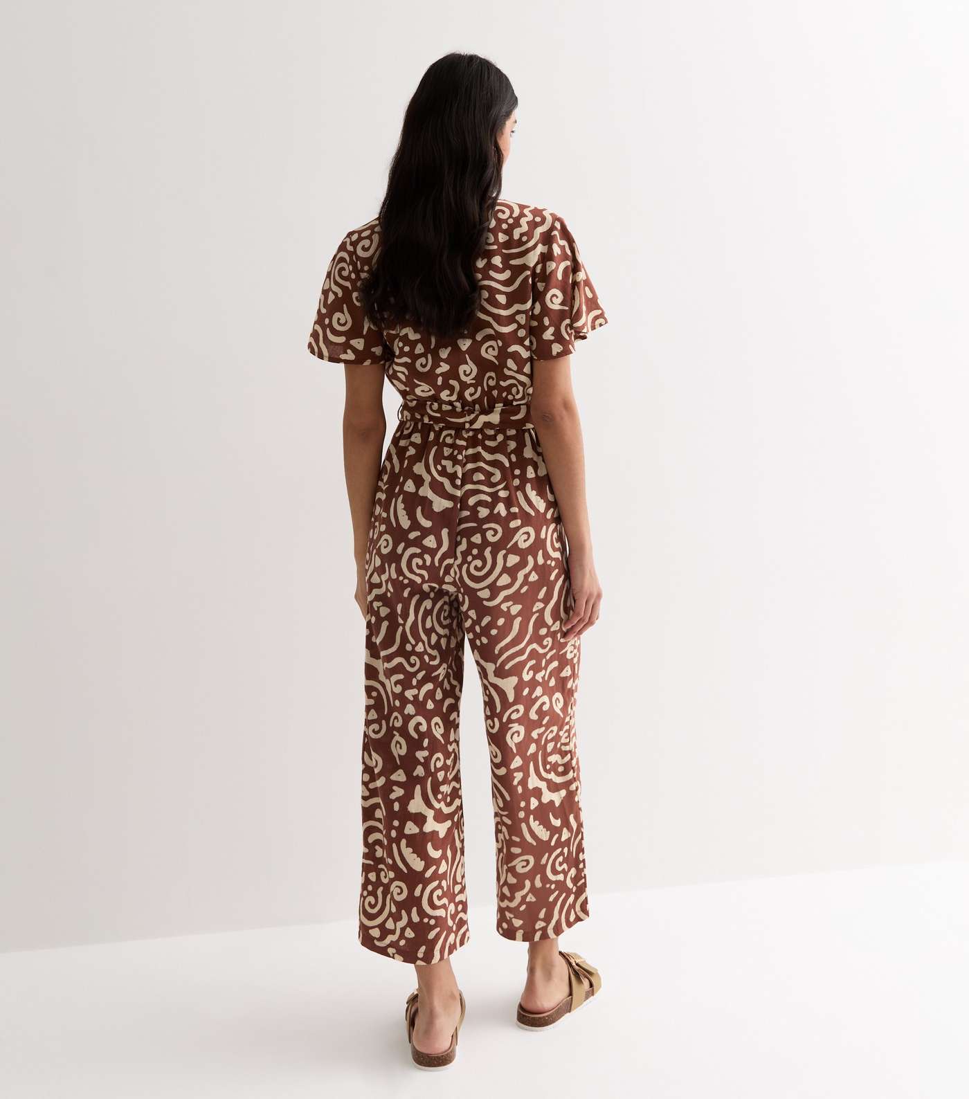 Brown Abstract Print Wrap Belted Wide Leg Jumpsuit Image 4