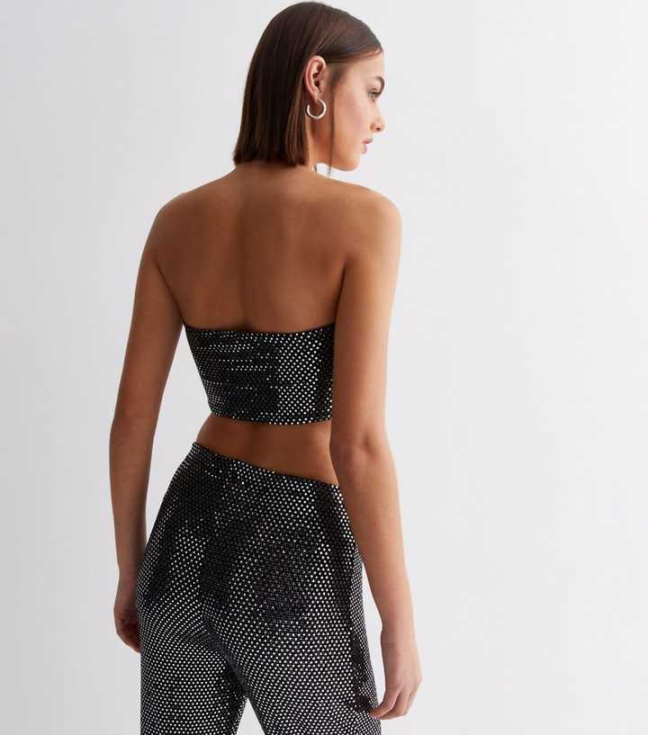 https://media2.newlookassets.com/i/newlook/886087201M3/womens/clothing/tops/pink-vanilla-black-sequin-bandeau-crop-top.jpg?strip=true&qlt=50&w=720