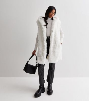 Hooded hot sale fur gilet