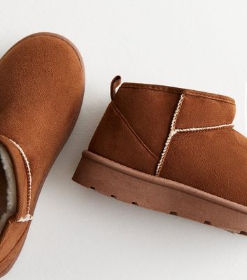 Tan slipper clearance boots