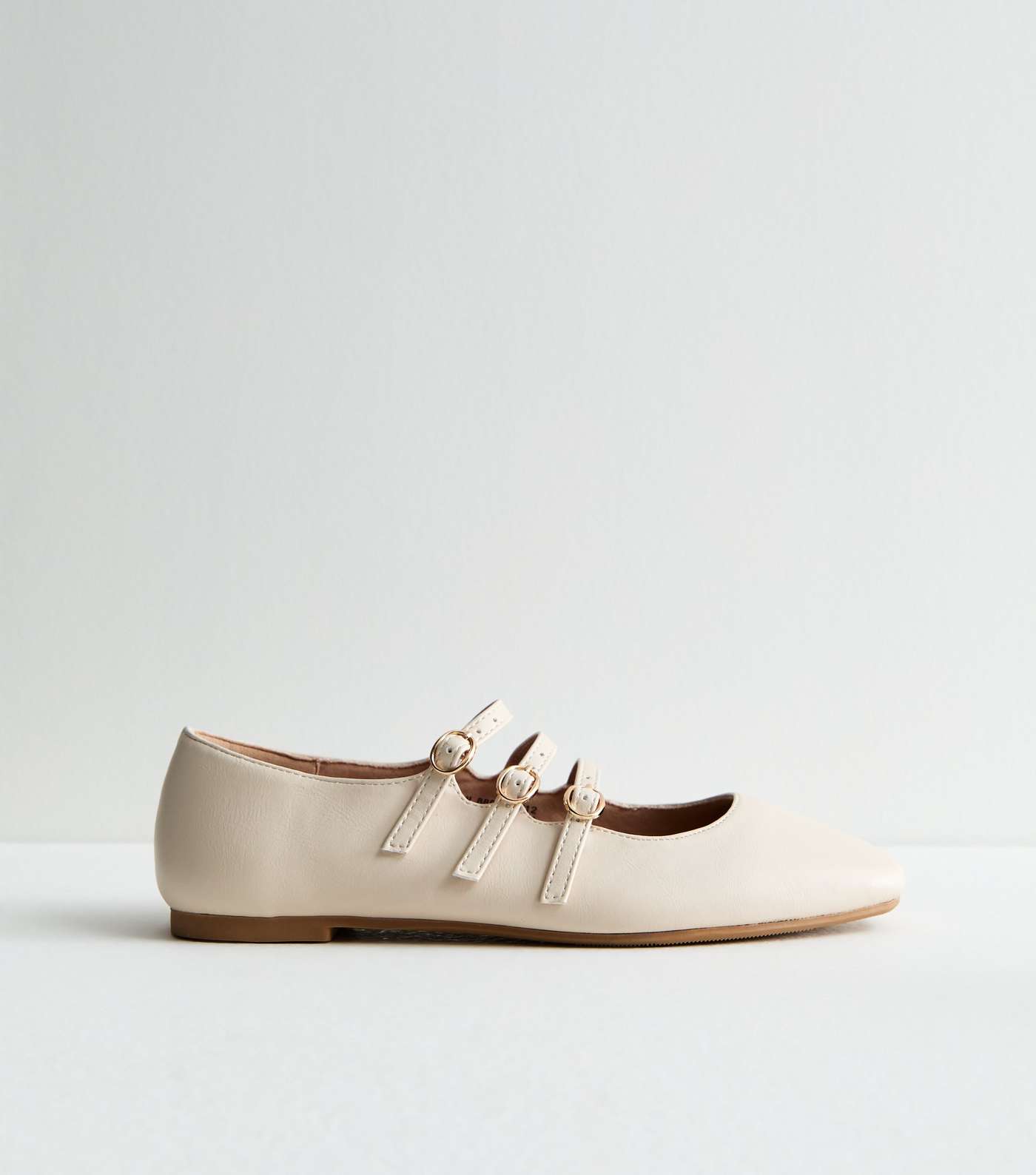 Off White Triple Strap Mary Jane Flats Image 3