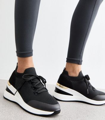 Black wedge heeled trainers deals