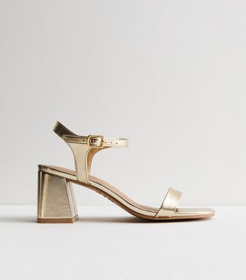 Short on sale gold heels