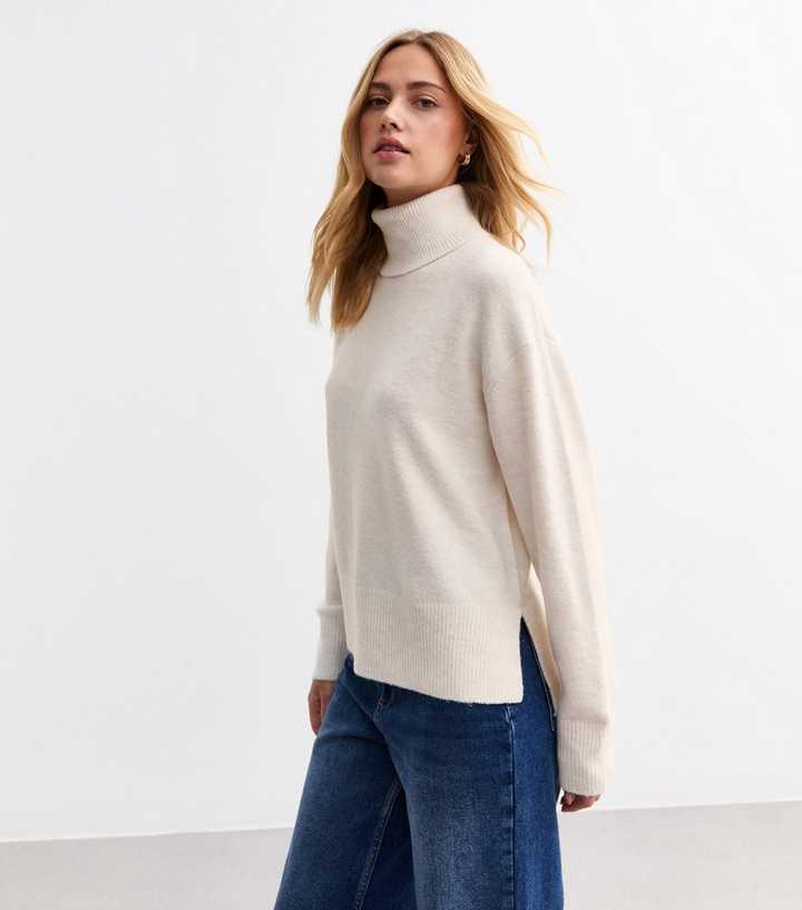 Off White Roll Neck Step Hem Jumper