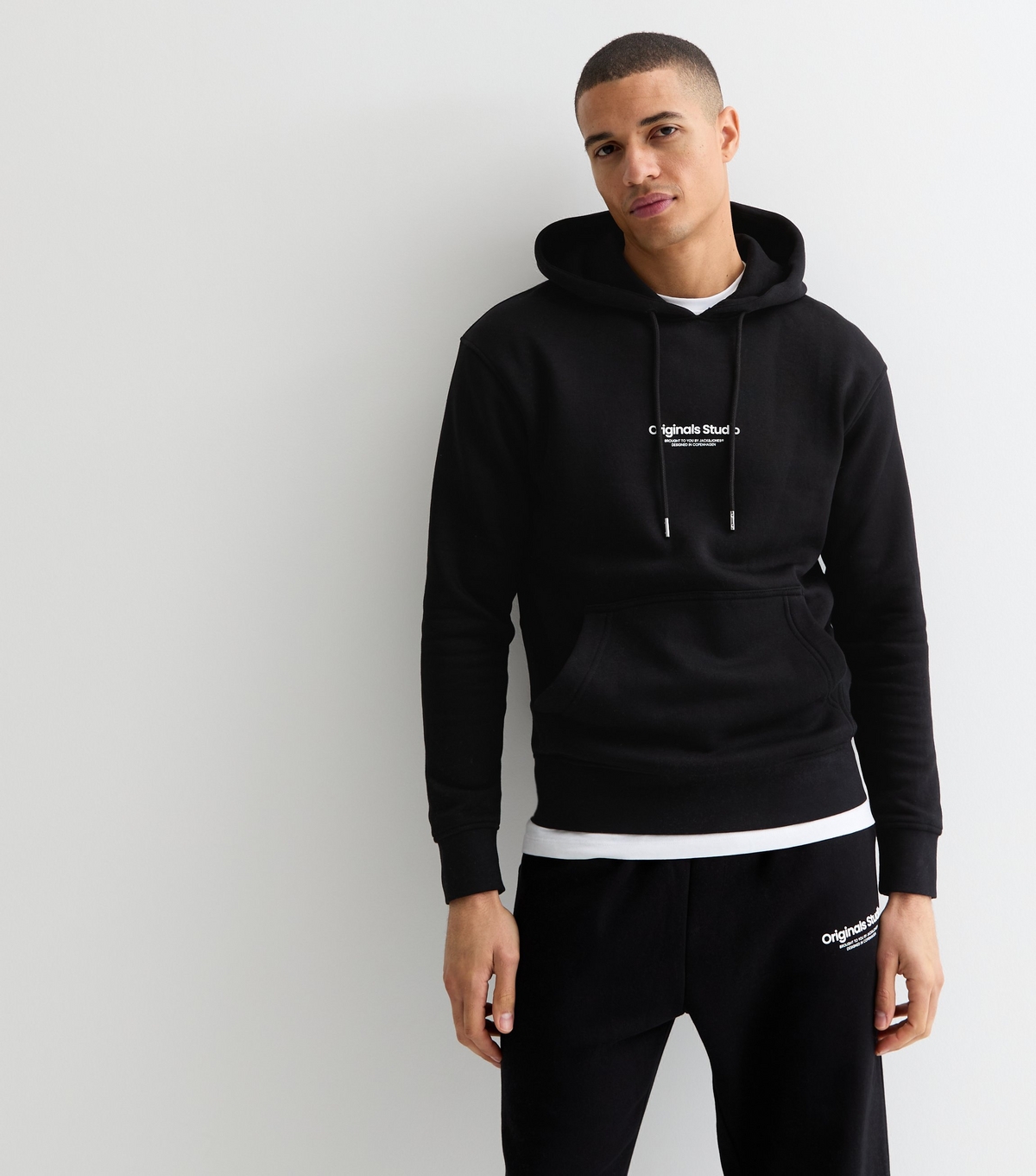 Men's Black Slim Original Studios Logo Hoodie Jack & Jones New Look