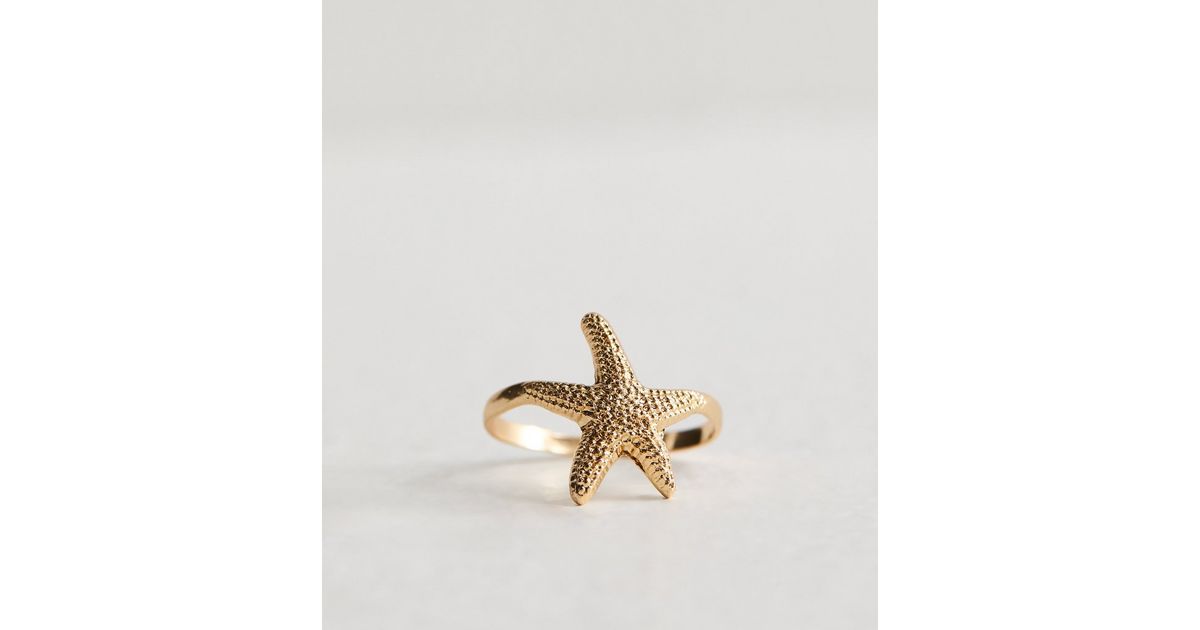 Gold Starfish and Conch Ring main image 1