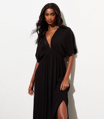 Short black v neck dress online