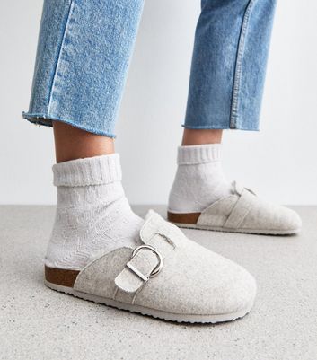 fur lined black mules