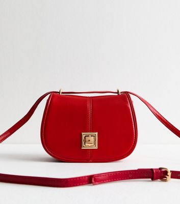 Red Leather Look Twist Lock Saddle Bag New Look