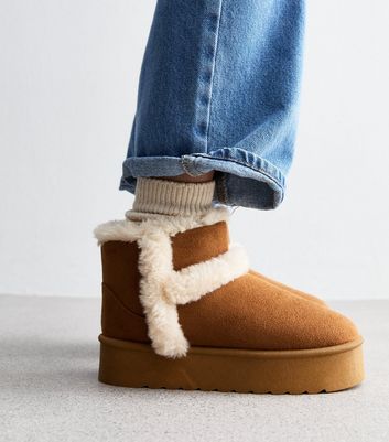 Fur lined tan boots best sale