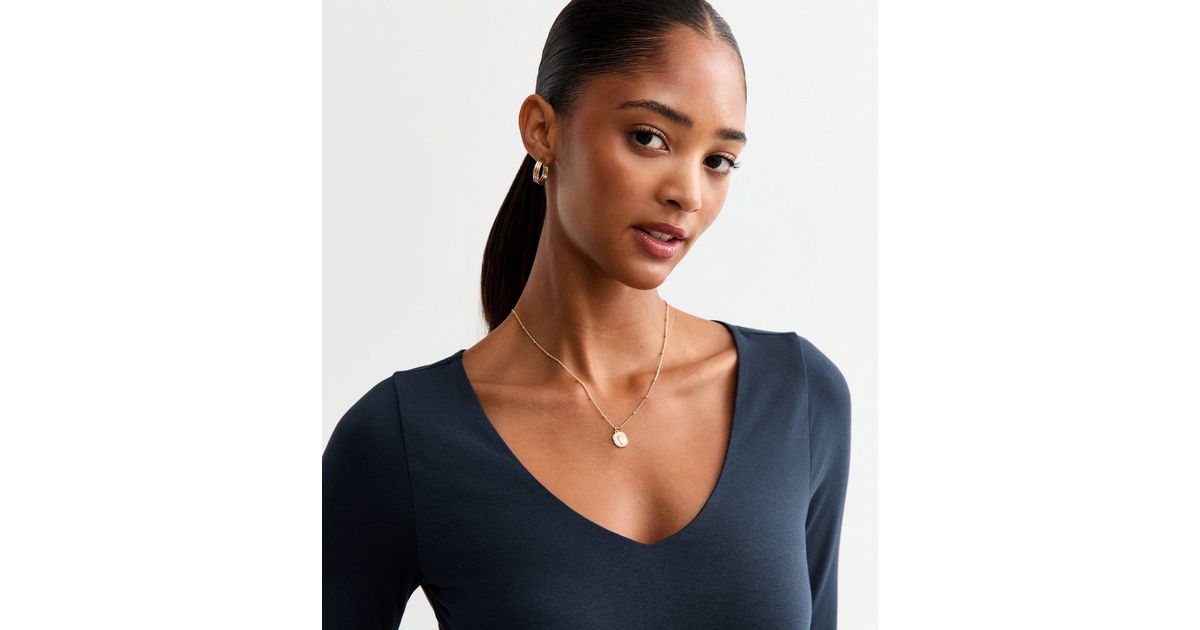 BOAT NECK LONG-SLEEVED BODYSUIT