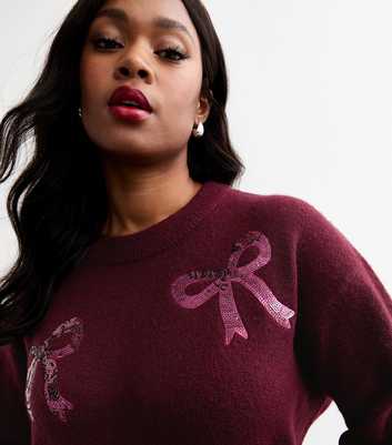 Curves Burgundy Sequinned Bow Jumper