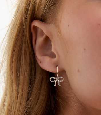 Silver Tone Diamante Bow Earrings