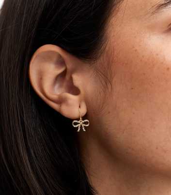 Gold Tone Diamante Bow Earrings