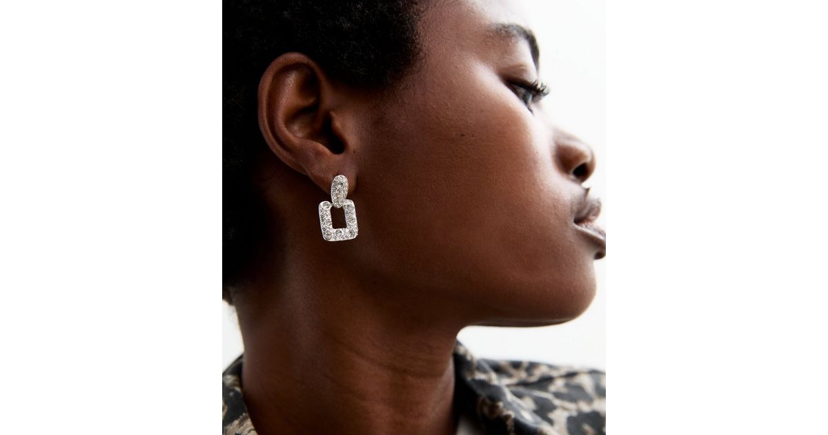 Blonde Rattan Bali Doorknocker Statement Earrings main image 1