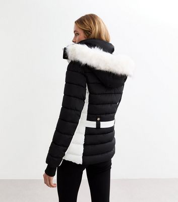 Black puffer jacket with white fur hood deals