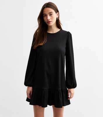 Black Textured Frill Hem Long Sleeved Mini Dress