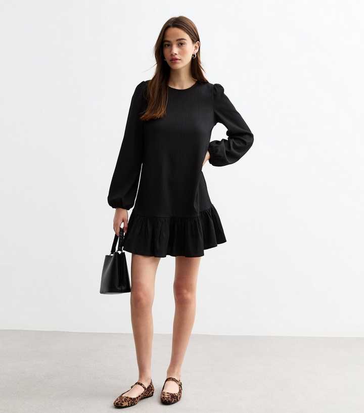 Black Textured Frill Hem Long Sleeved Mini Dress