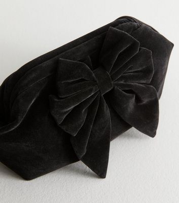 Black bow clutch bag on sale