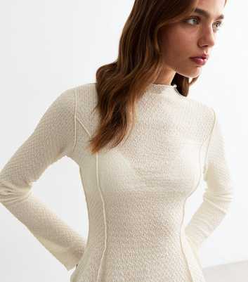 Cream Textured Exposed Seam Top