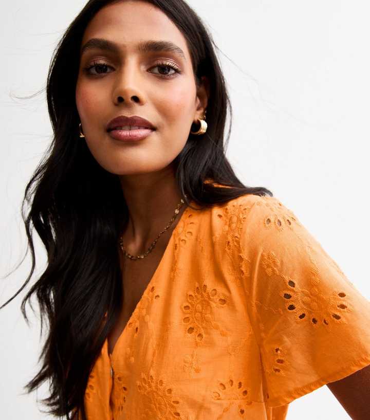 orange broderie anglaise dress Buy Lipsy Orange Broderie Flutter Sleeve Midi Dress from the Next UK online shop