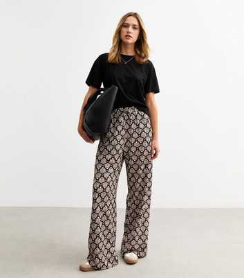 Black Fan Print Textured Wide Leg Trousers