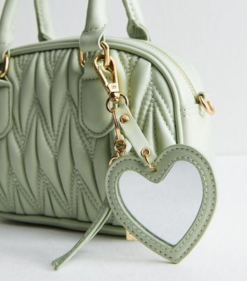 Light Green Quilted Faux Leather Mini Crossbody Bag | New Look