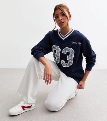 girls-navy-93-appliqued-v-neck