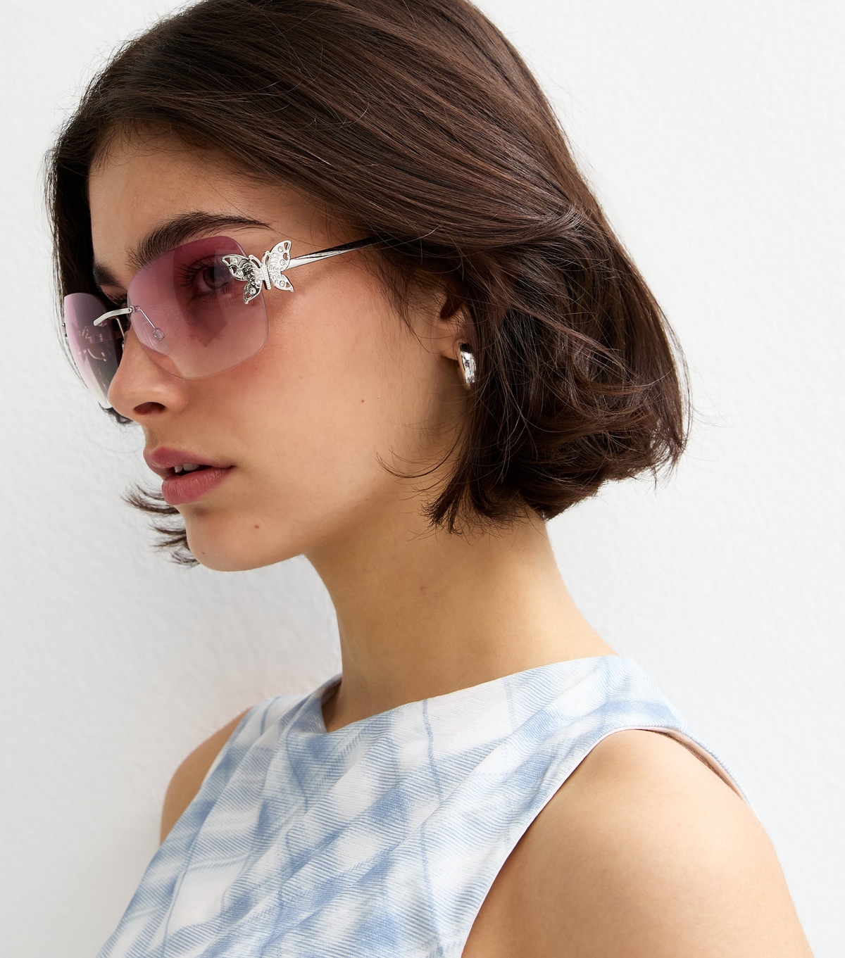 Light Pink Butterfly Charm Rimless Wrap Sunglasses New Look