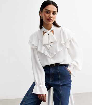 Off White Ruffle Trimmed Tie Neck Blouse